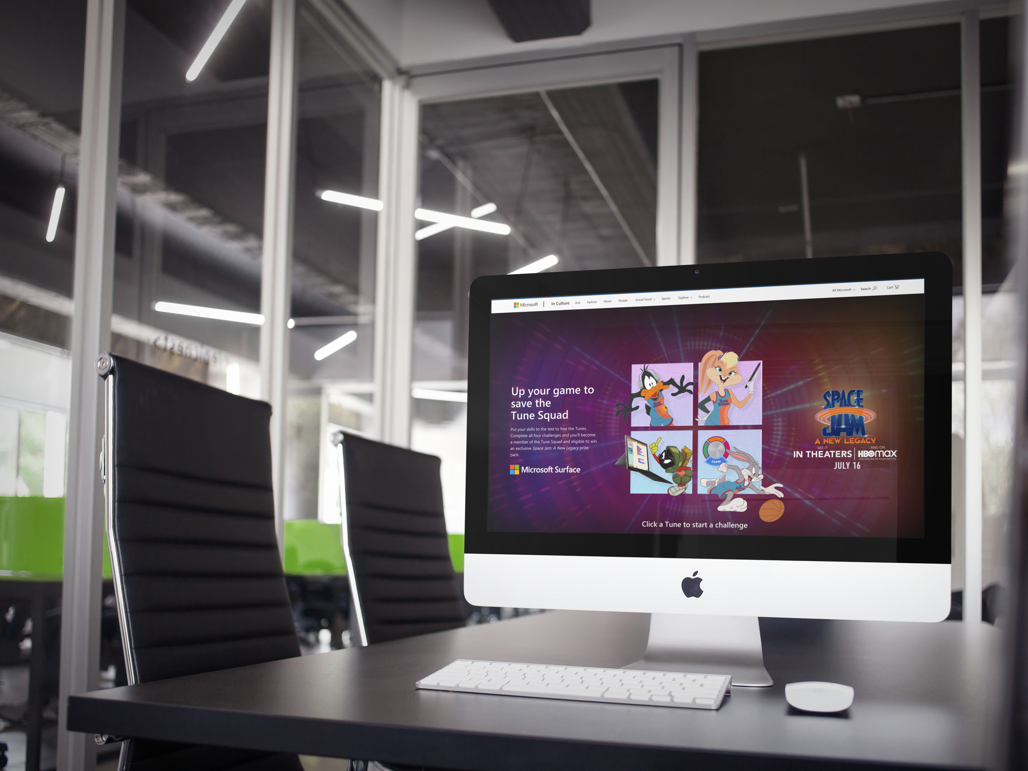 large iMac setup in modern office conference room